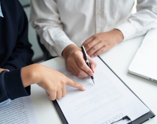 Lawyer,Businessman,Working,With,Lawbook,In,Office,Or,Courtroom,Legal